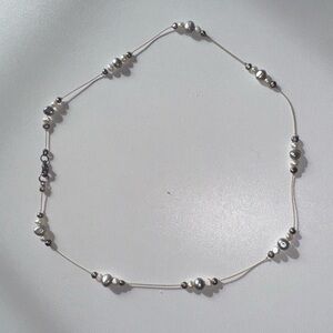 Elegant Pearl and Silver Beaded Necklace